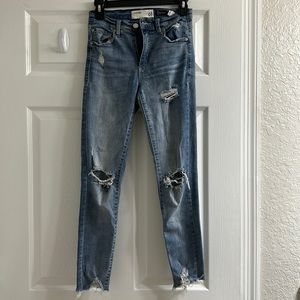 High-rise Light-wash Ripped Jeans